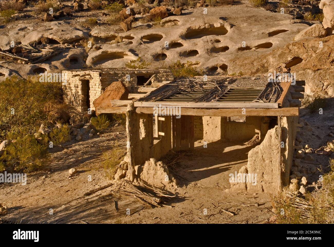 Ruins of adobe houses and wind caves near abandoned mines in Three Dike