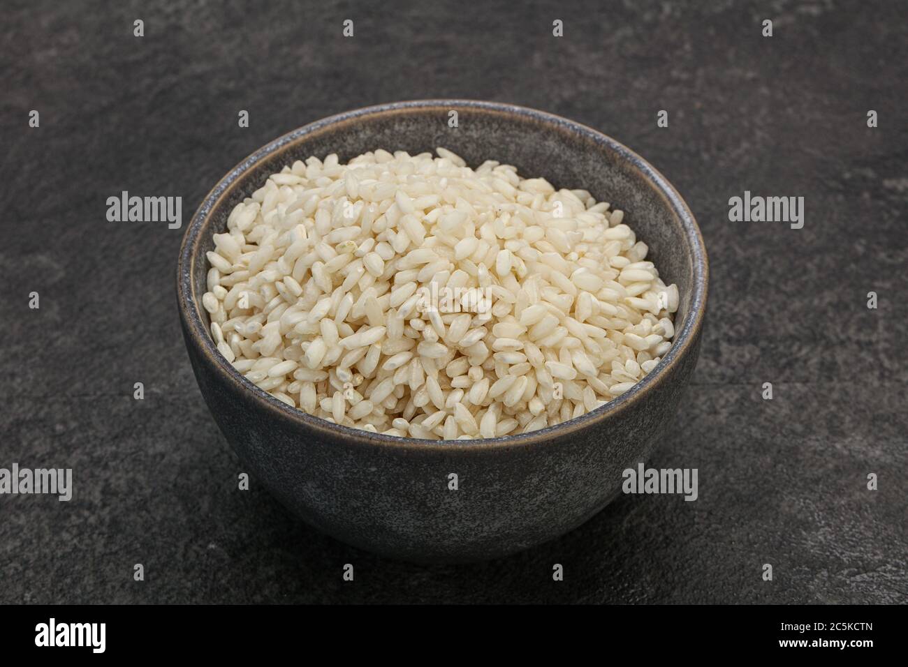 Raw Italian arborio rice for Risotto Stock Photo - Alamy