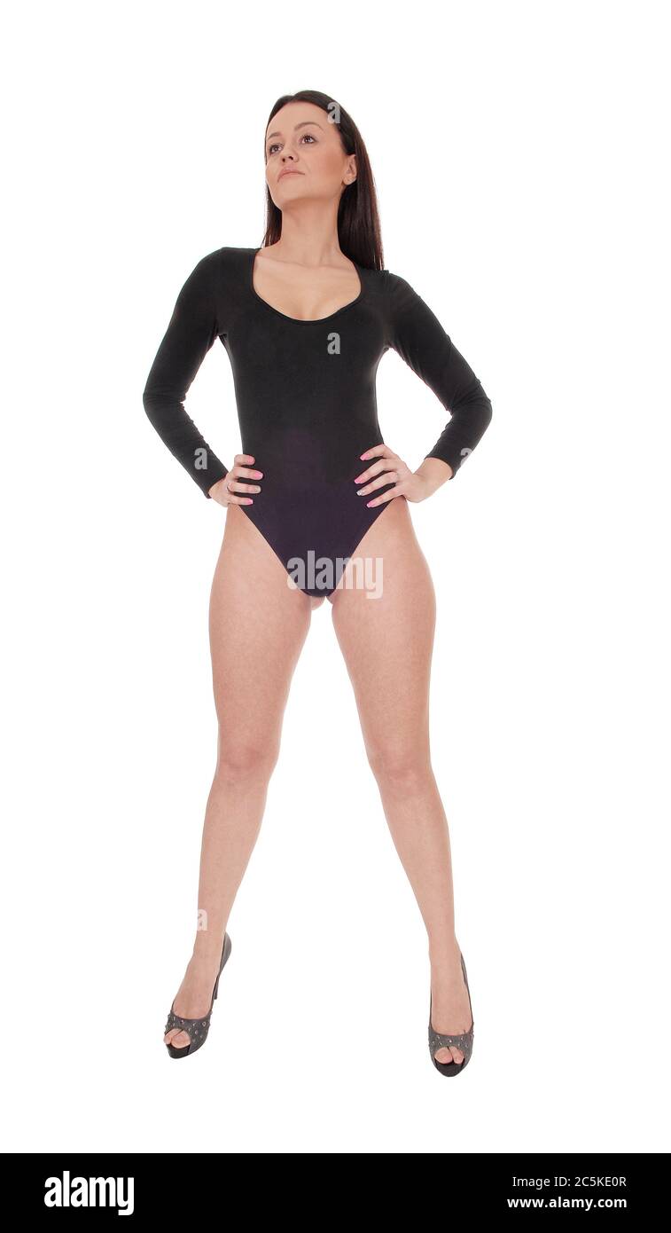 A young beautiful woman standing in a black body suit and long legs, with  long hair, showing her nice figure, isolated for white background Stock  Photo - Alamy