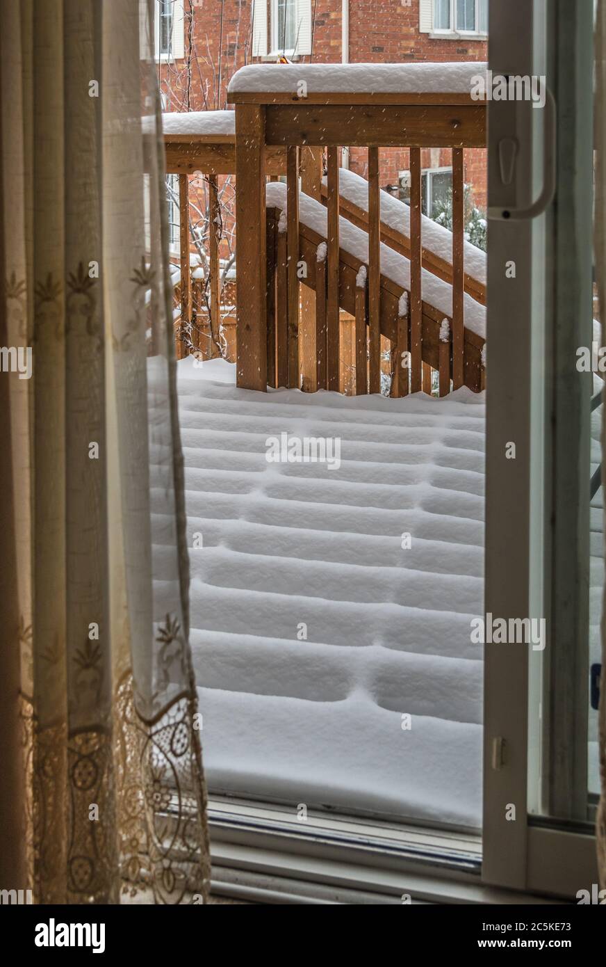 Shadow and pattern on snow surface through a door Stock Photo - Alamy