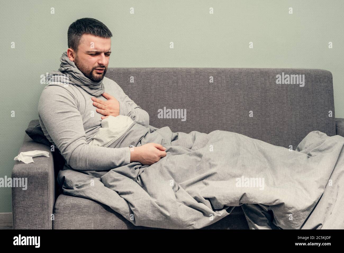 Disease. Cheer at home. A young man is sick, is treated at home. Chest