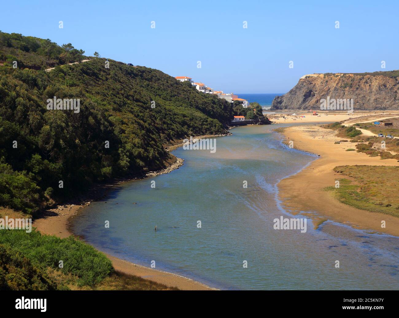 Portugal, Algarve Region, Odeceixe, South-West Alentejo and Vicentine Coast Natural Park cliff top view of the Odeceixe beach and estuary. Stock Photo
