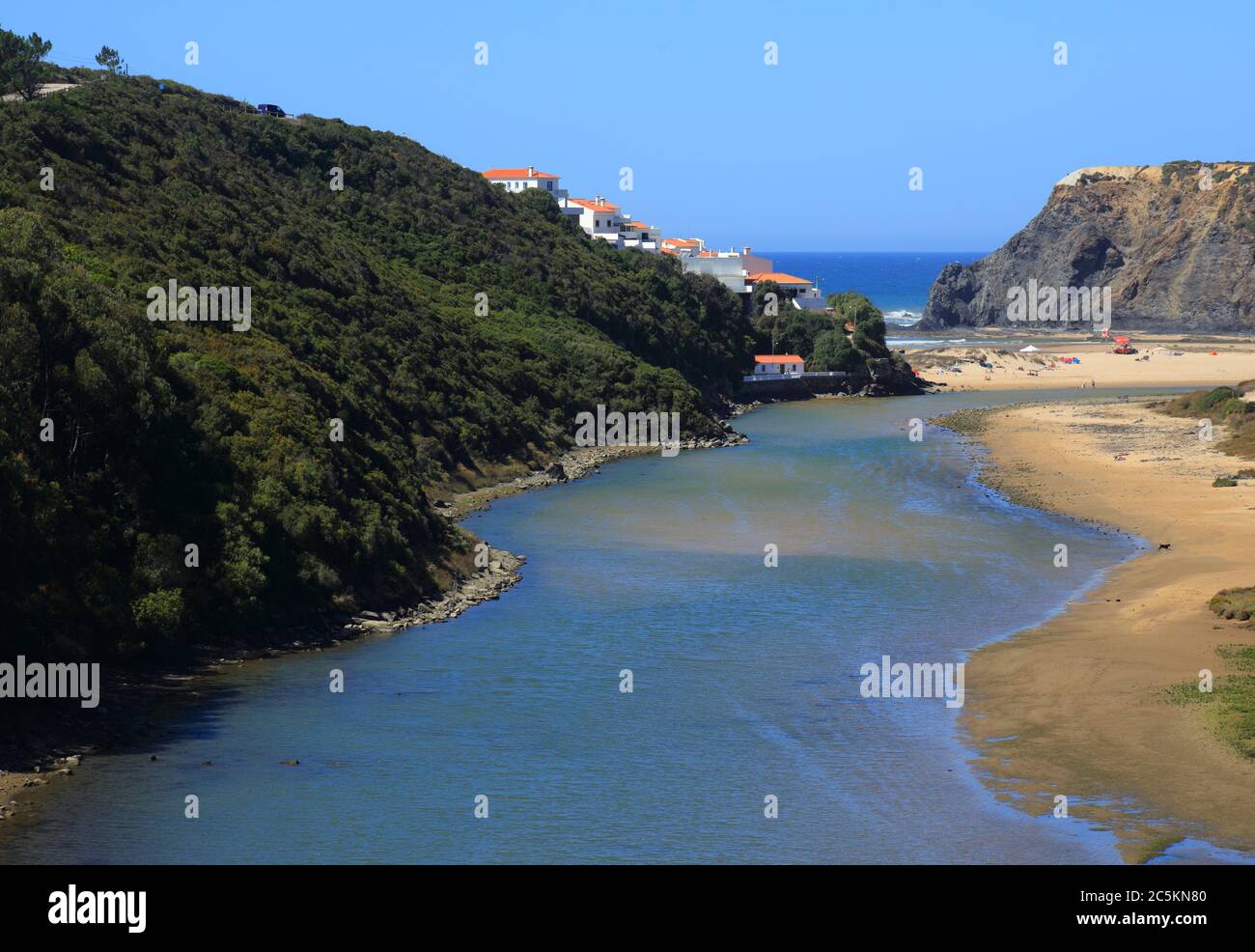 Portugal, Algarve Region, Odeceixe, South-West Alentejo and Vicentine Coast Natural Park cliff top view of the Odeceixe beach and estuary. Stock Photo