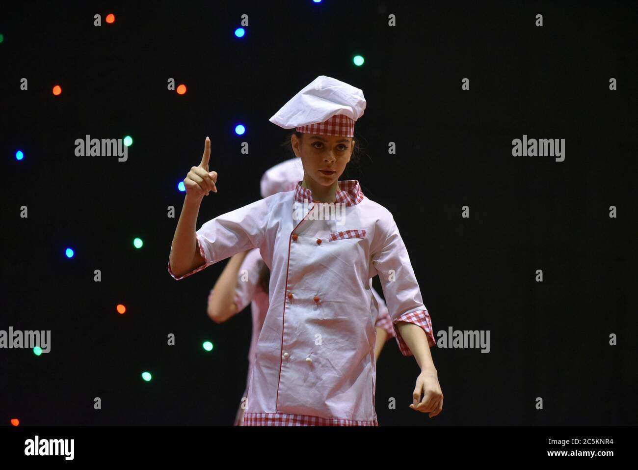 Young teenage girl in chefs cook's uniform Stock Photo - Alamy