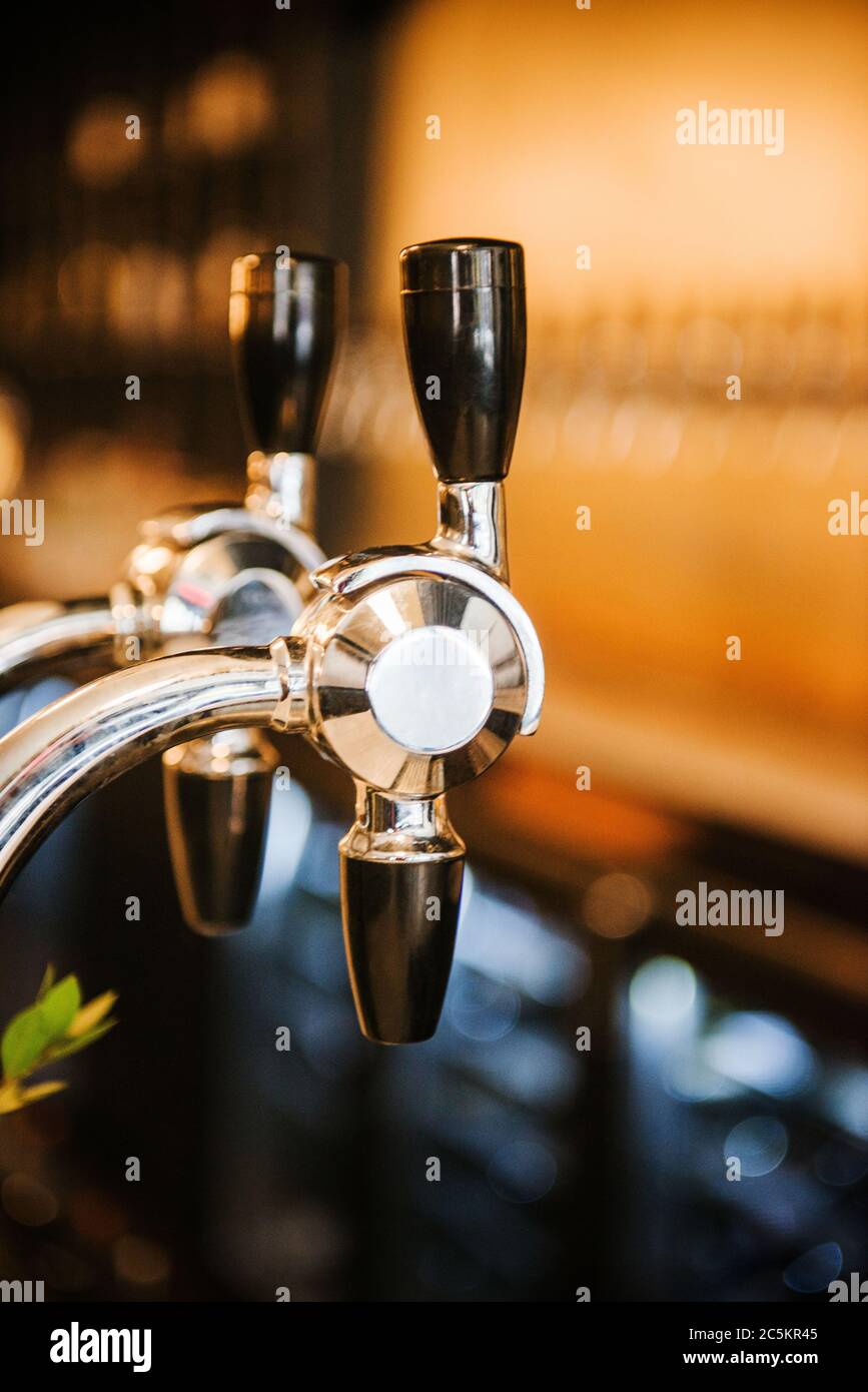 Beer/beverage tap in a bar Stock Photo