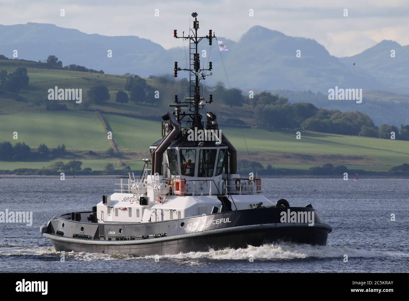 SD Resourceful, an ATD 2909-class tug operated by Serco Marine Services, passes East India Harbour in Greenock. Stock Photo