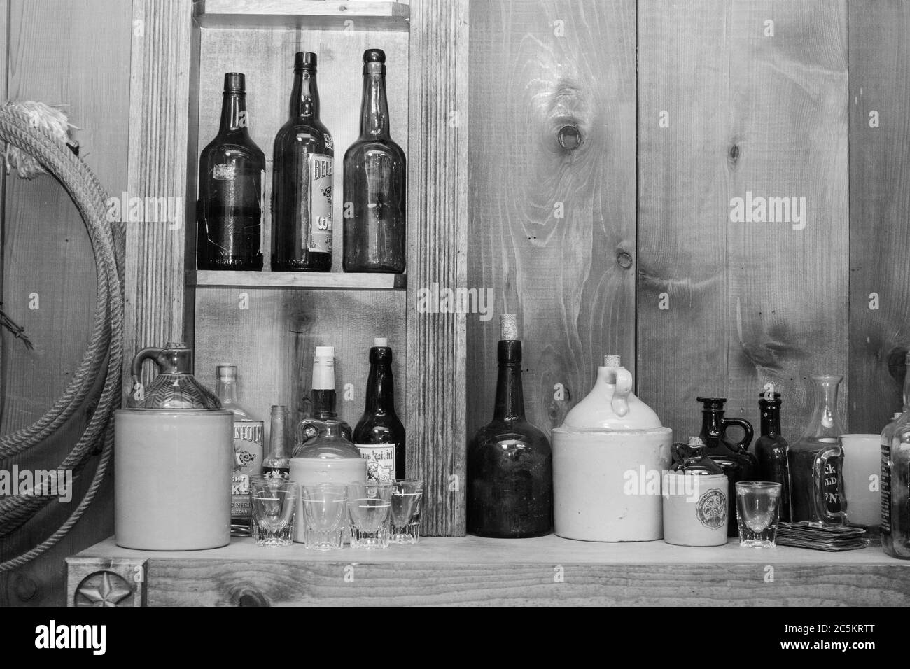 Old West Saloon Close up Image of Antique Old Fashioned Bottles Stock Photo