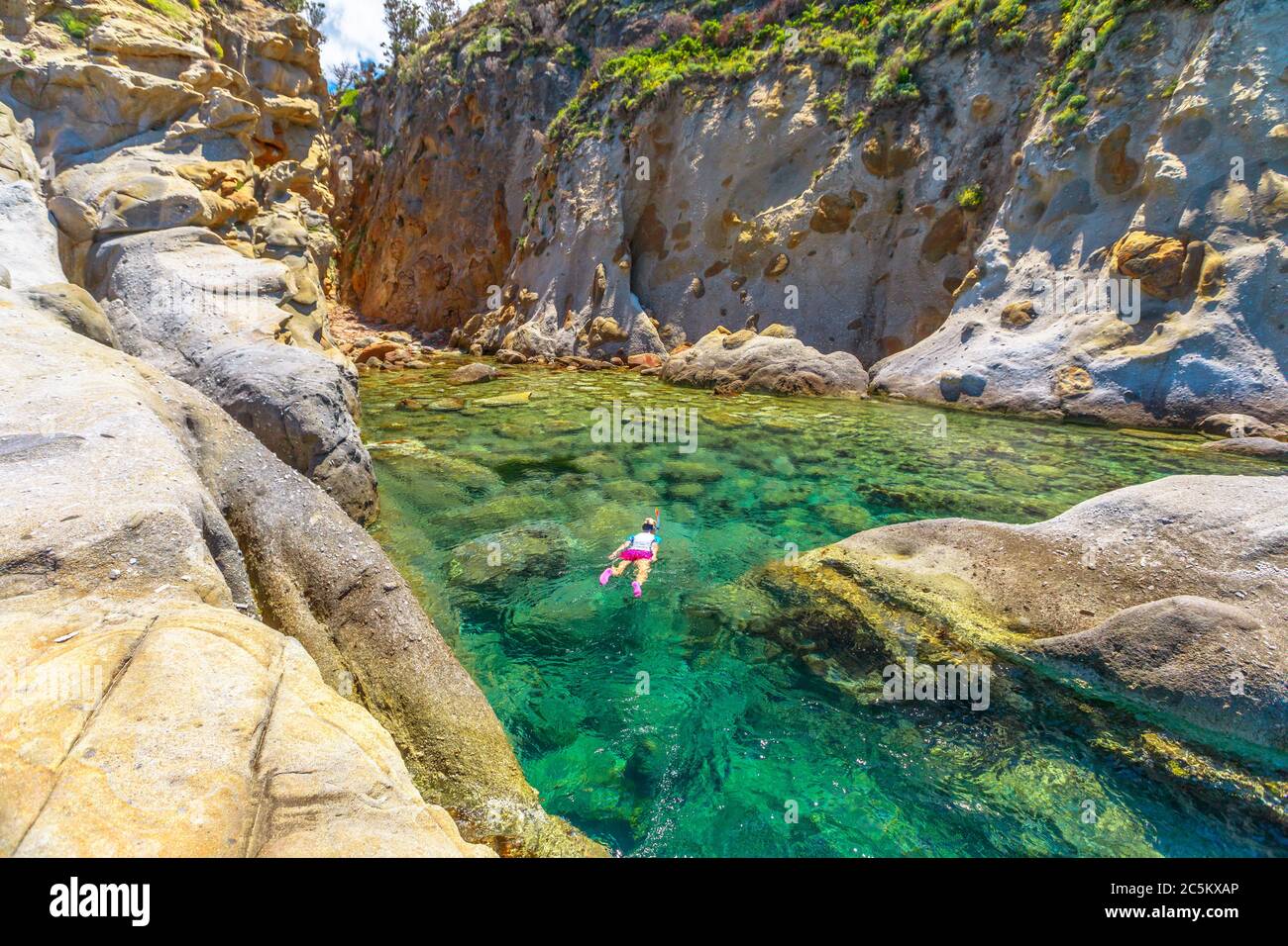 Snorkeler and tropical island hi-res stock photography and images - Alamy