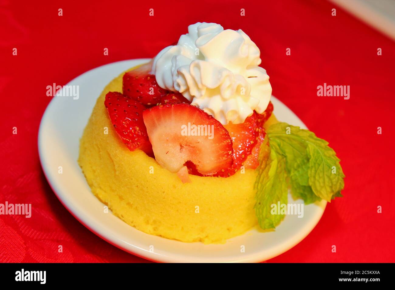 Cake with fresh sliced strawberries and whipped topping Stock Photo Alamy