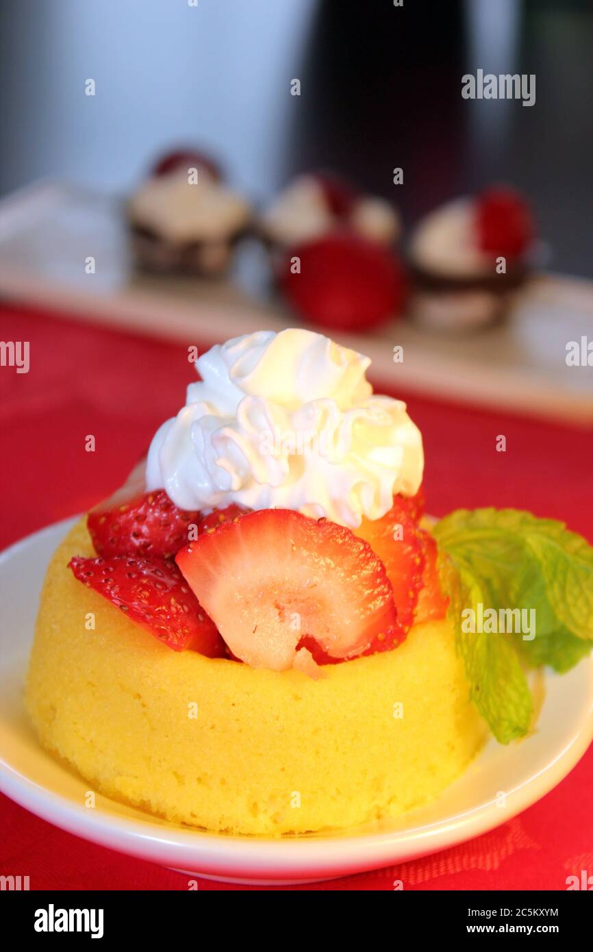 Cake with fresh sliced strawberries and whipped topping Stock Photo Alamy