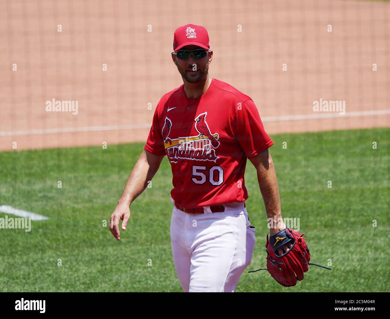 St. Louis, United States. 03rd July, 2020. St. Louis Cardinals pitcher Adam Wainwright walks in from the bullpen during batting practice at the team's first spring training workout at Busch Stadium in St. Louis on Friday, July 3, 2020. Major League Baseball is starting their 2020 season after the COVID-19 pandemic caused months of delays. Photo by Bill Greenblatt/UPI Credit: UPI/Alamy Live News Stock Photo