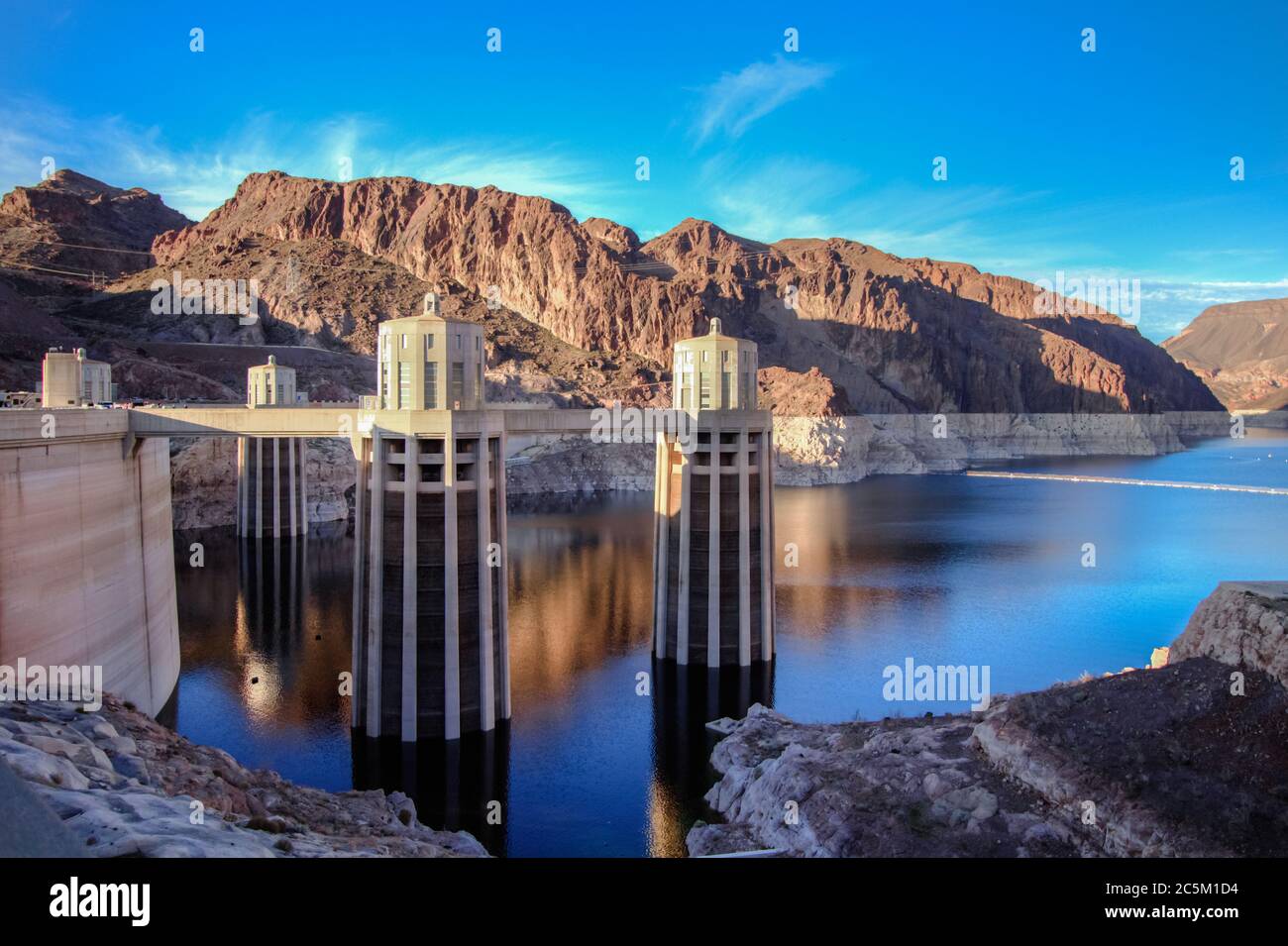 Hoover Dam And Lake Mead Panorama. Scenic wide angle view of Hoover Dam and Lake Mead on the Arizona Nevada border. Stock Photo