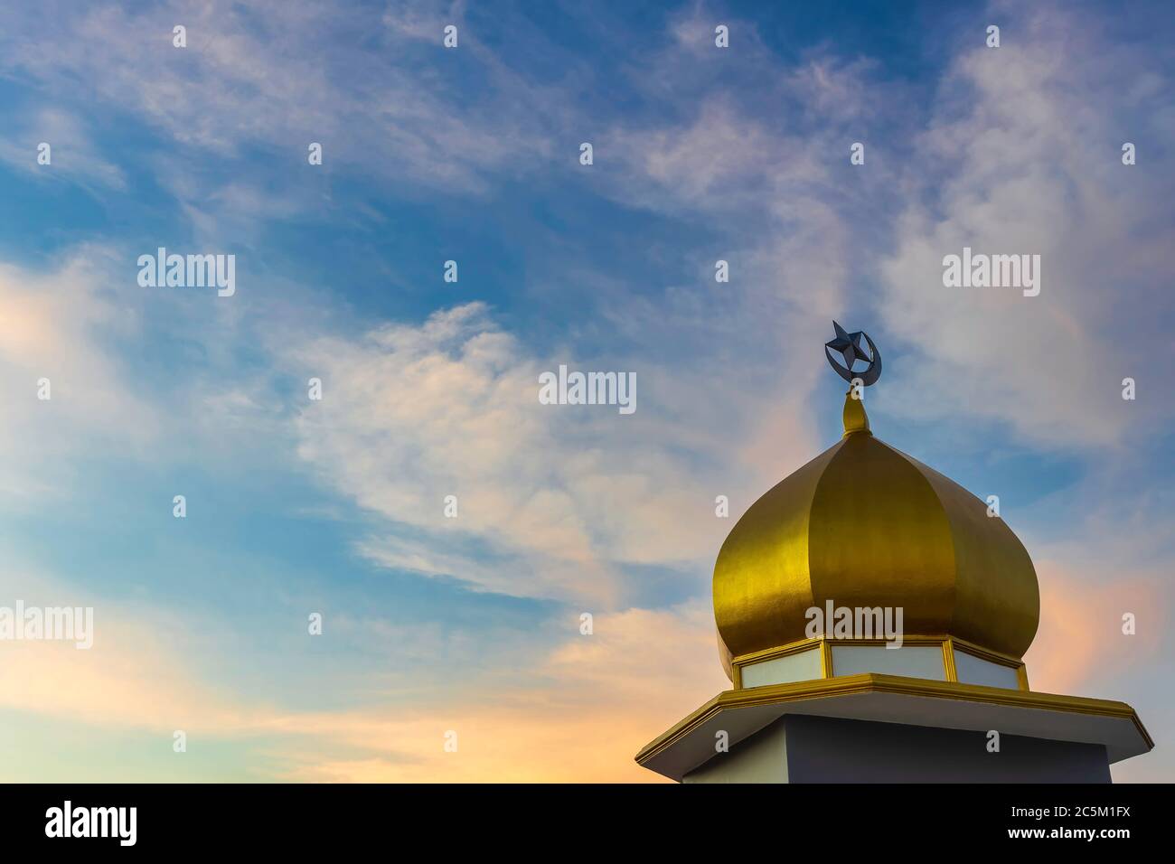 The golden dome with the symbol of Islam is the crescent moon and star ...