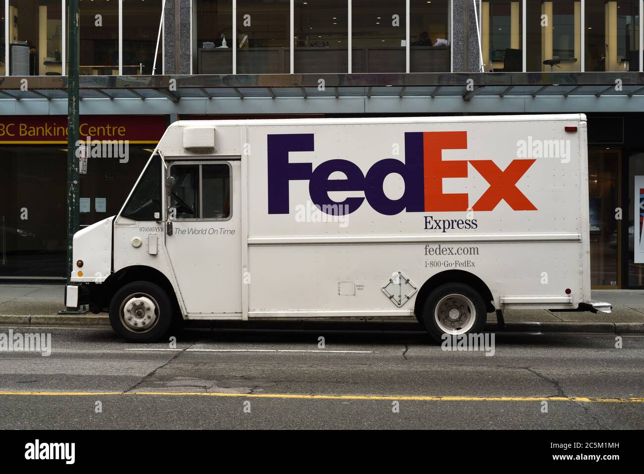 A FedEx express parcel delivery courier van sits parked on a downtown  Vancouver, British Columbia, Canada street outside a CIBC banking centre  Stock Photo - Alamy