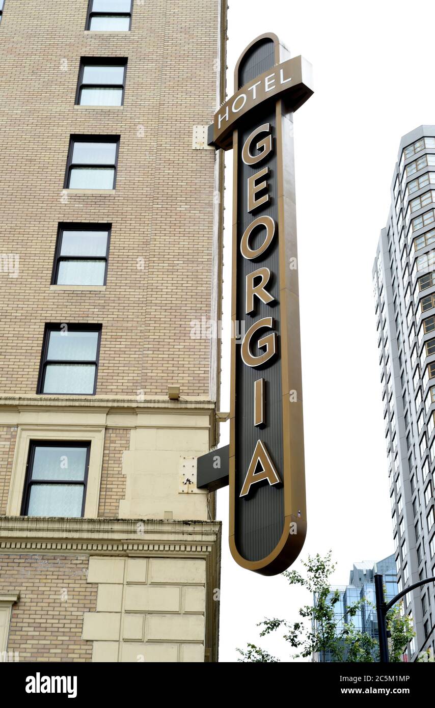 A identifying sign is mounted on the side of the luxury Rosewood Hotels’ Hotel Georgia on W. Georgia Street in downtown Vancouver, British Columbia, C Stock Photo