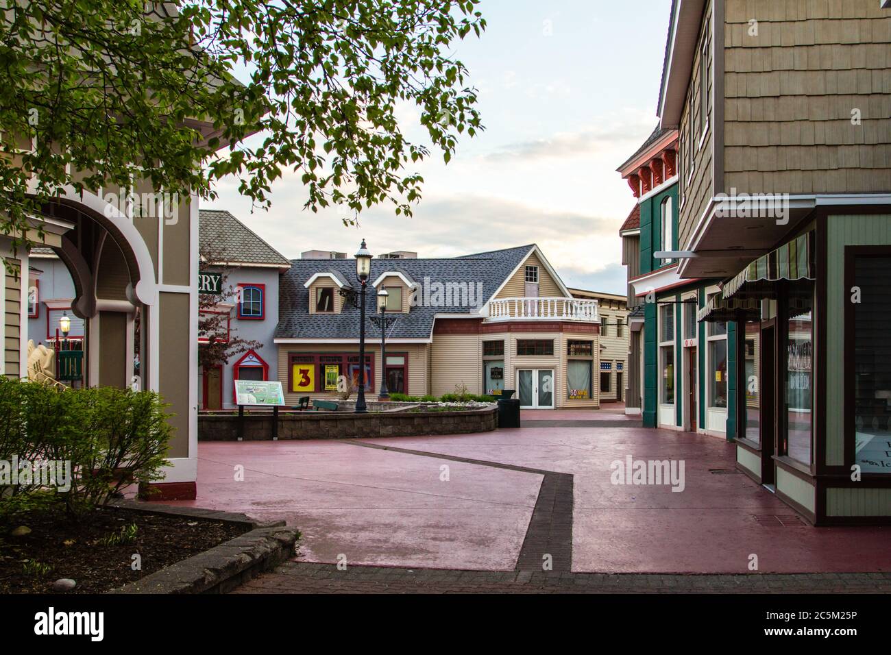 Mackinaw City, Michigan, USA -  Empty outdoor shopping mall during the height of the summer tourist season in Mackinaw City at Mackinaw Crossings Stock Photo