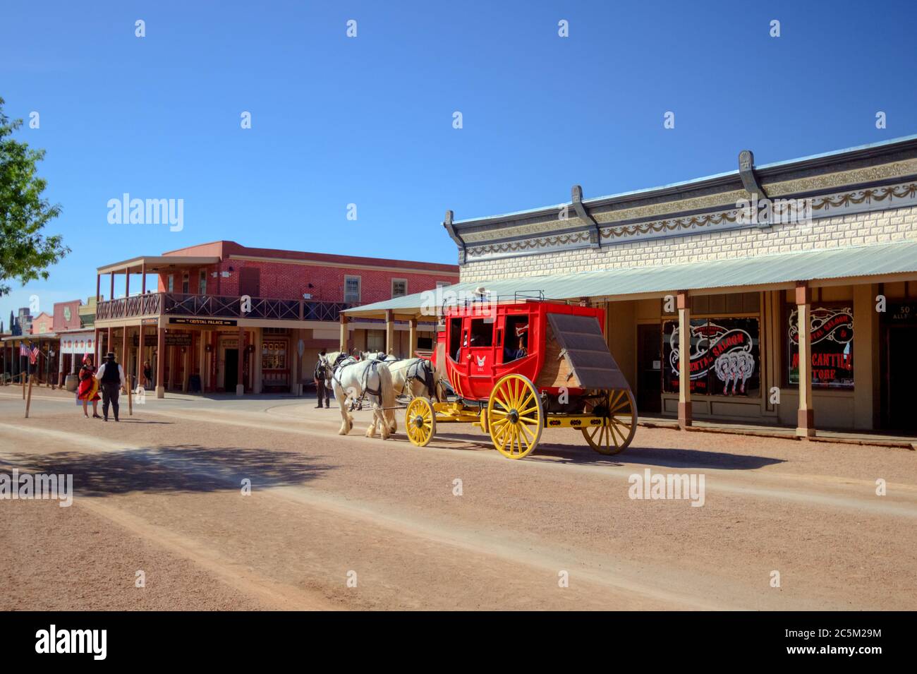 Tombstone, Arizona, USA - May 1, 2019: Stagecoach and Wild West style storefront facades on the streets of historic Tombstone. Stock Photo