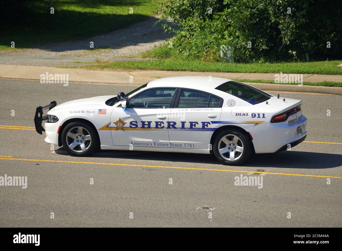 Jamestown, Virginia, U.S.A - June 29, 2020 - A police car stopped in the middle of the road to patrol the street Stock Photo
