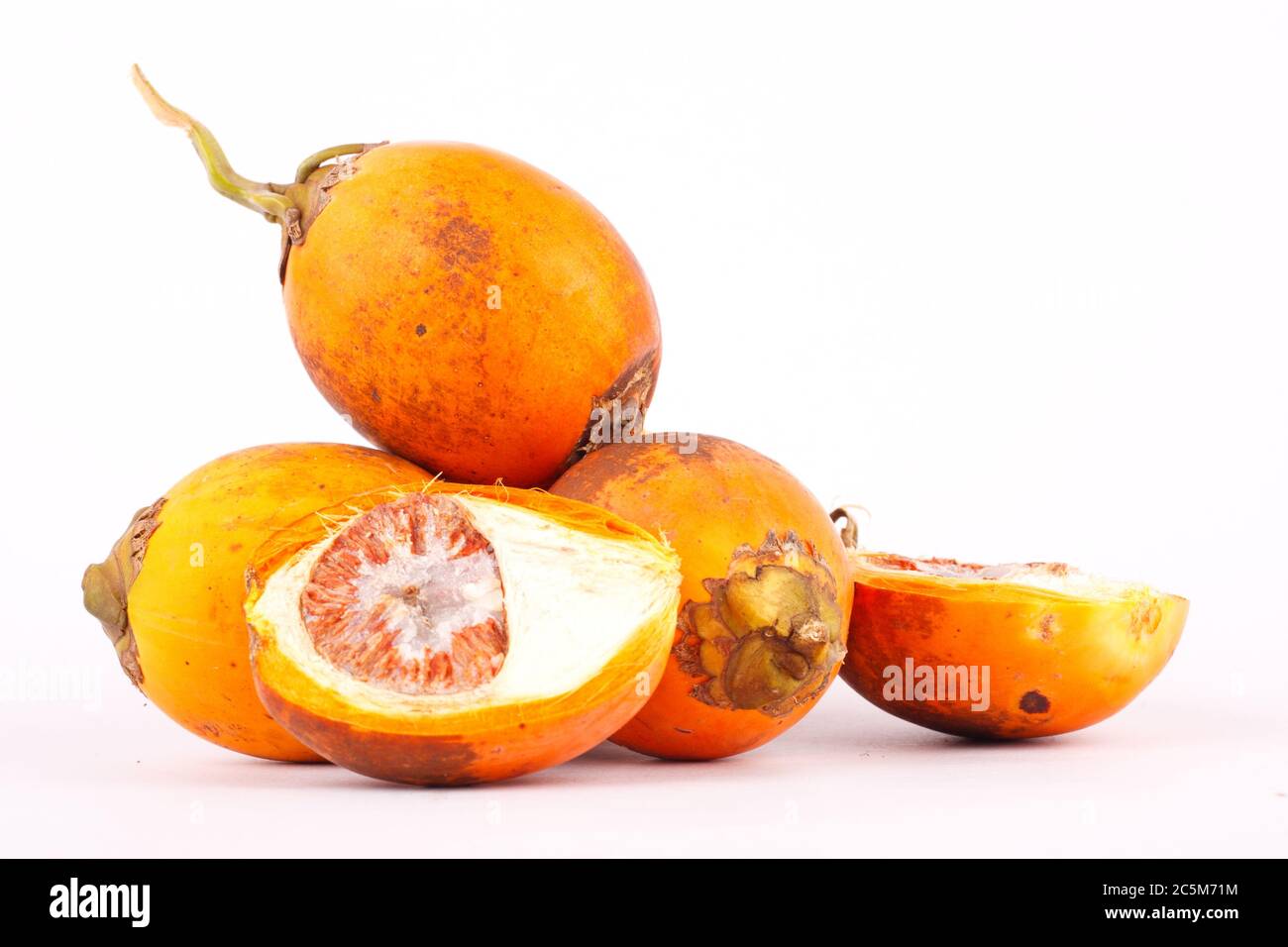 Ripe Betel nut is a yellowish orange Stock Photo