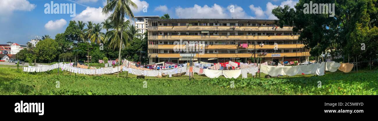 Clothes drying on a very long clothesline Stock Photo
