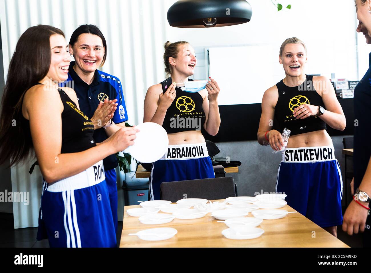 Ukrainian Women's Boxing League, Katya Rogova(L),Inna Statkevich(R) celebrate Inna's 25yrs after successfully weighing out on 30 July in Kiev Sparta Stock Photo