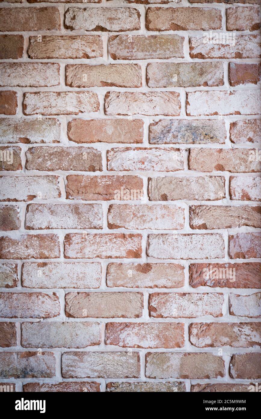 Brick wall with modern textured finish to look aged, background Stock Photo
