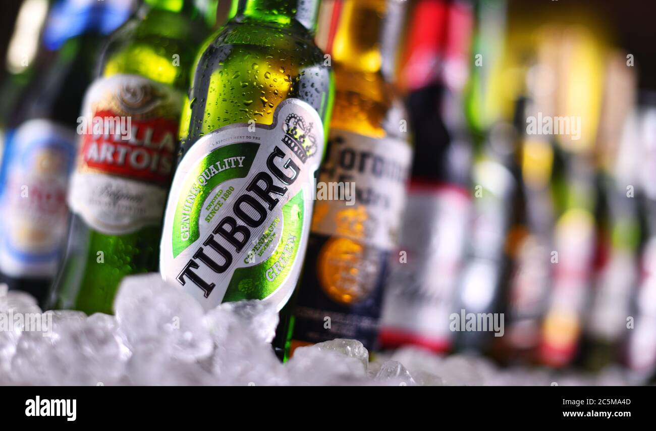 POZNAN, POL - DEC 23, 2019: Bottles of famous global beer brands including Tuborg, Heineken, Becks, Bud, Miller, Corona, Stella Artois, and Pilsner Ur Stock Photo