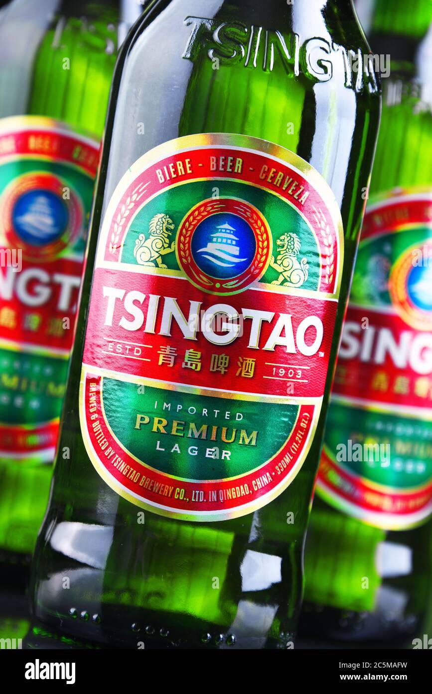 POZNAN, POL JAN 10, 2020 Bottles of Tsingtao beer, product of