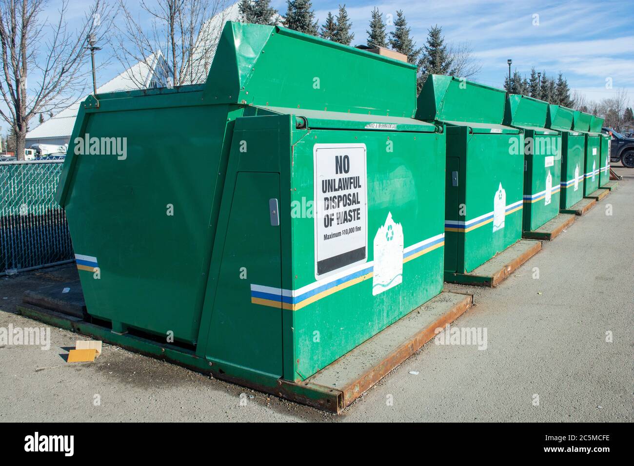 Large Community Recycling Bins - Containers in Park Lot Stock Photo