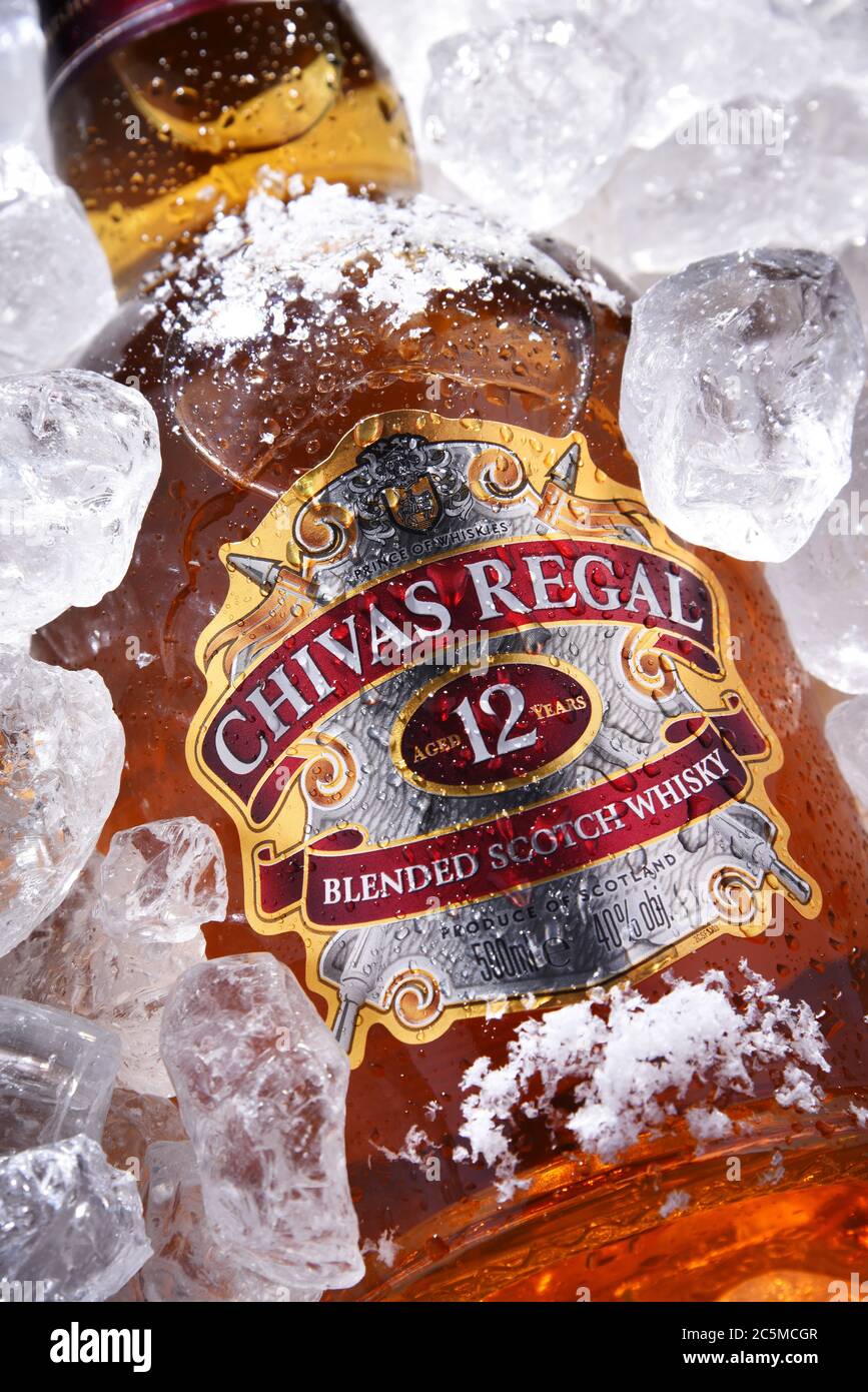 POZNAN, POL - MAY 28, 2020: Bottle of Chivas Regal 12, a blended Scotch whisky made from whiskies matured for at least 12 years, produced by Chivas Br Stock Photo