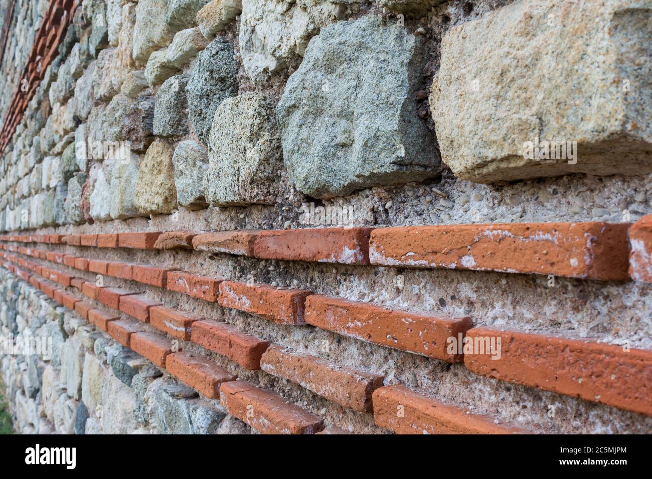 Ancient Roman empire wall, detail, close up Stock Photo - Alamy