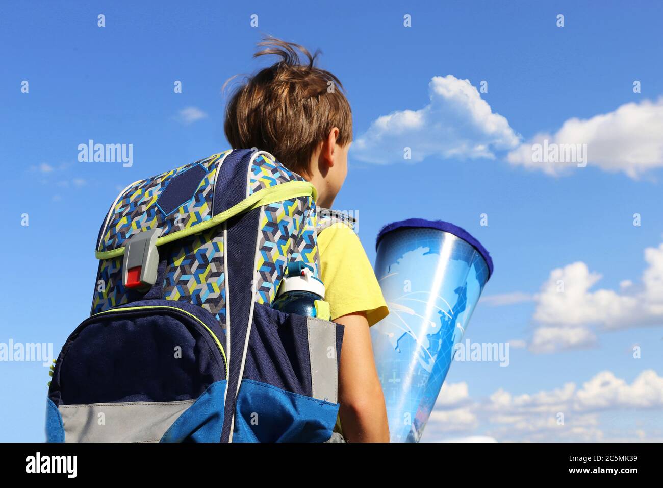 Boy on his way to his first day of school, Model released Stock Photo
