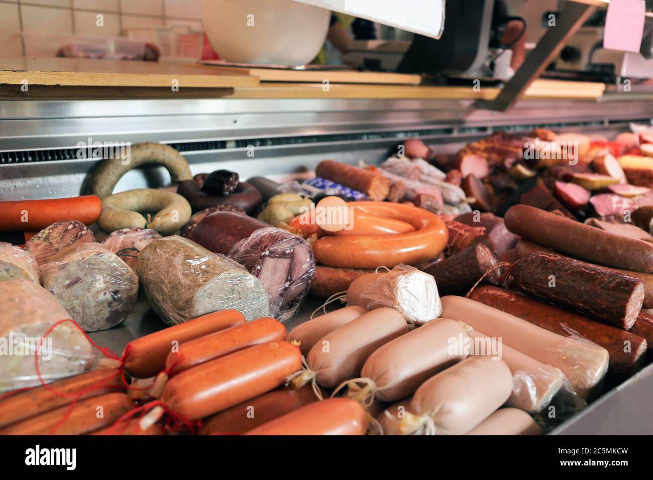 Sausage counter in a butcher's shop Stock Photo Alamy