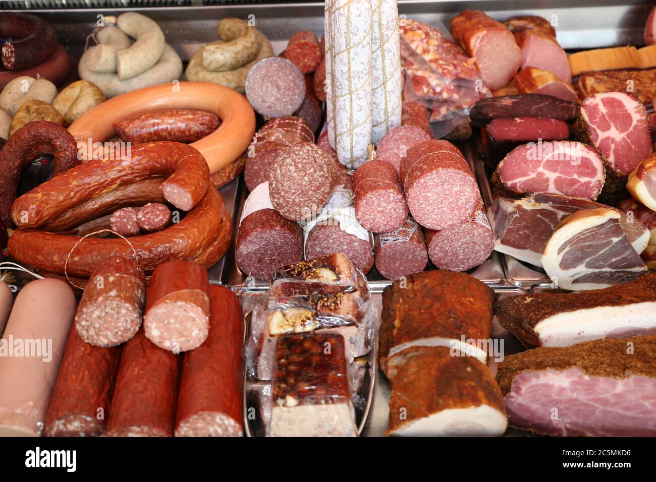 Sausage counter in a butcher's shop Stock Photo Alamy