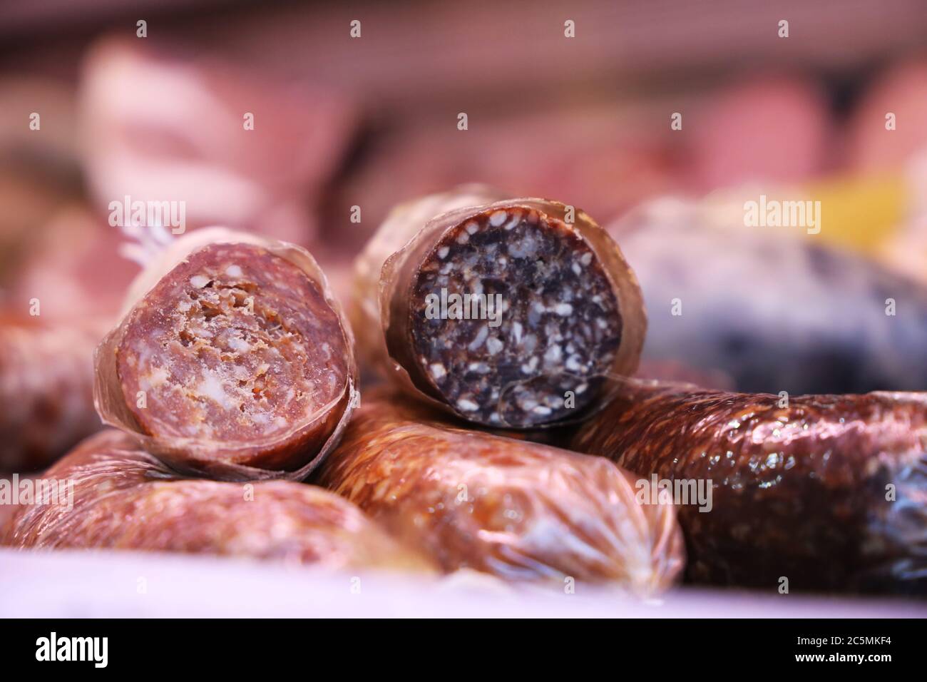 Sausage counter in a butcher's shop Stock Photo Alamy