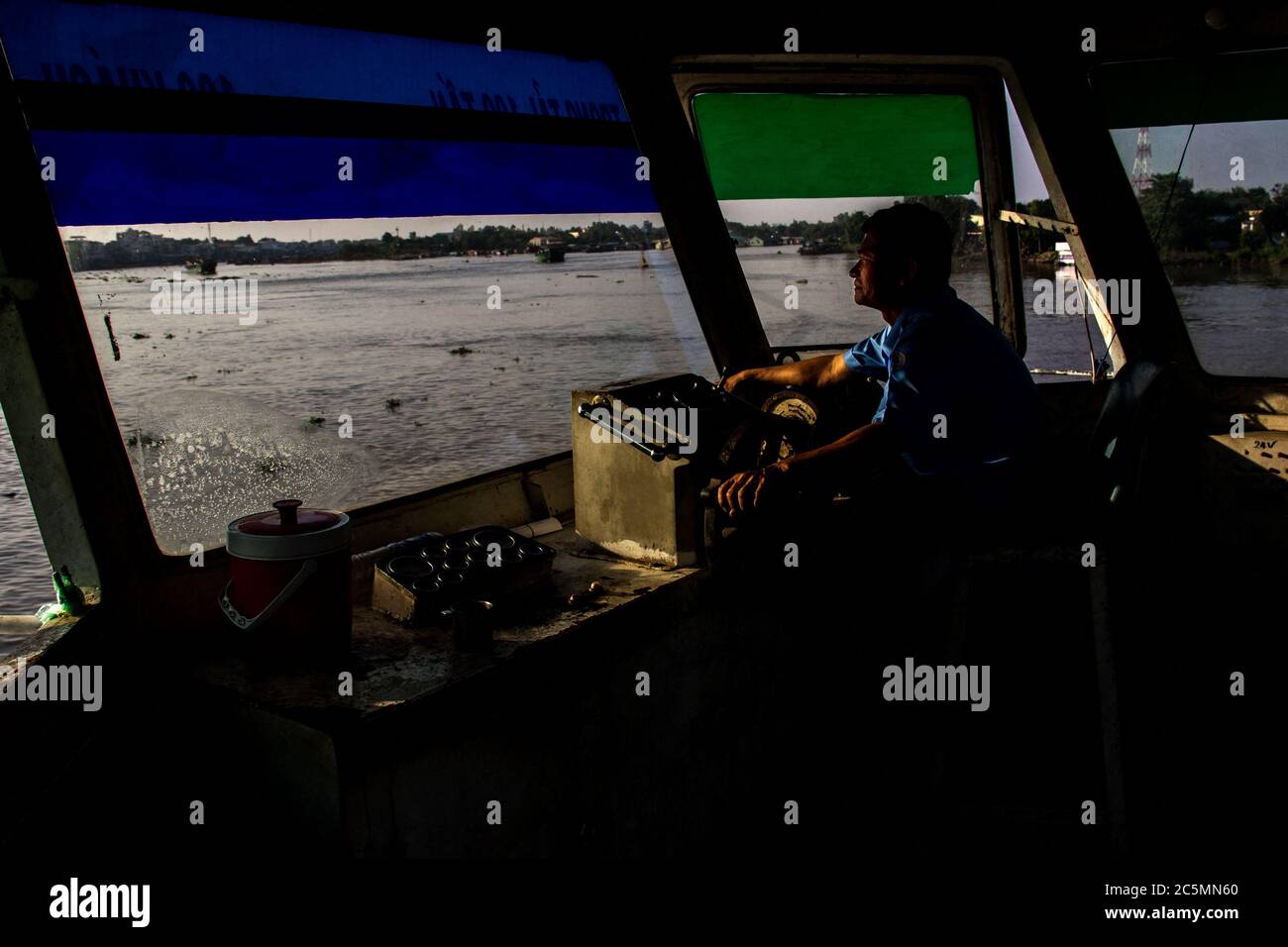 VIETNAM - ON THE FERRIES OF THE DELTA OF MEKONG. In the Mekong Delta ...