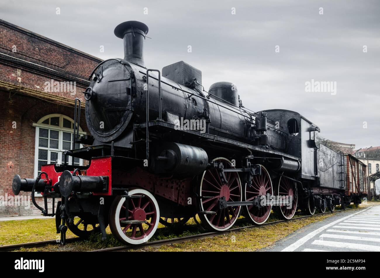 Italian steam locomotive in the station of Turin Ponte Mosca