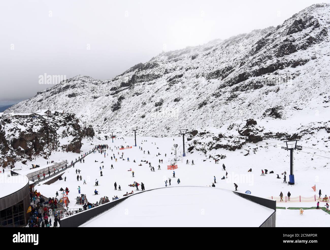 Wellington. 4th July, 2020. People ski at Whakapapa ski field in New Zealand's North Island, July 4, 2020. The ski field opened a small part at a lower elevation to the public on Friday. Credit: Guo Lei/Xinhua/Alamy Live News Stock Photo