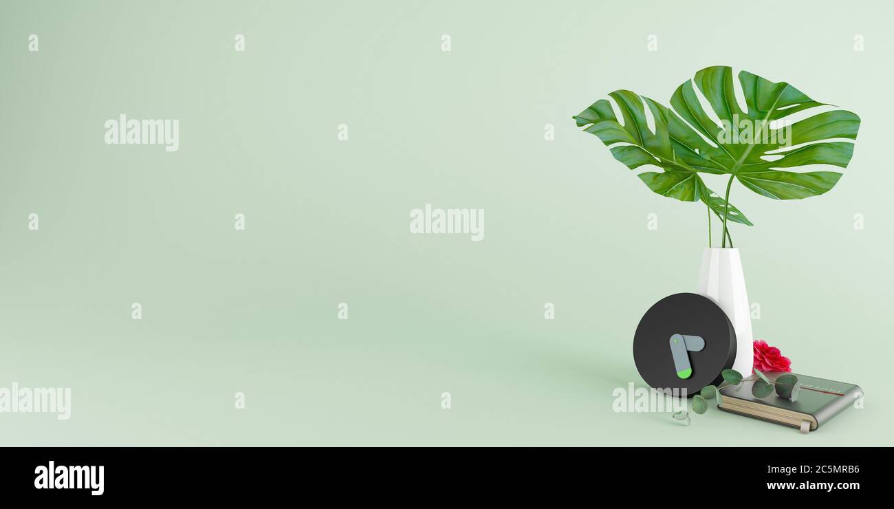 Black alarm clock and vases with leaves and note book and red flower on lighting green background, time concept, minimal composition, Stylish abstract Stock Photo