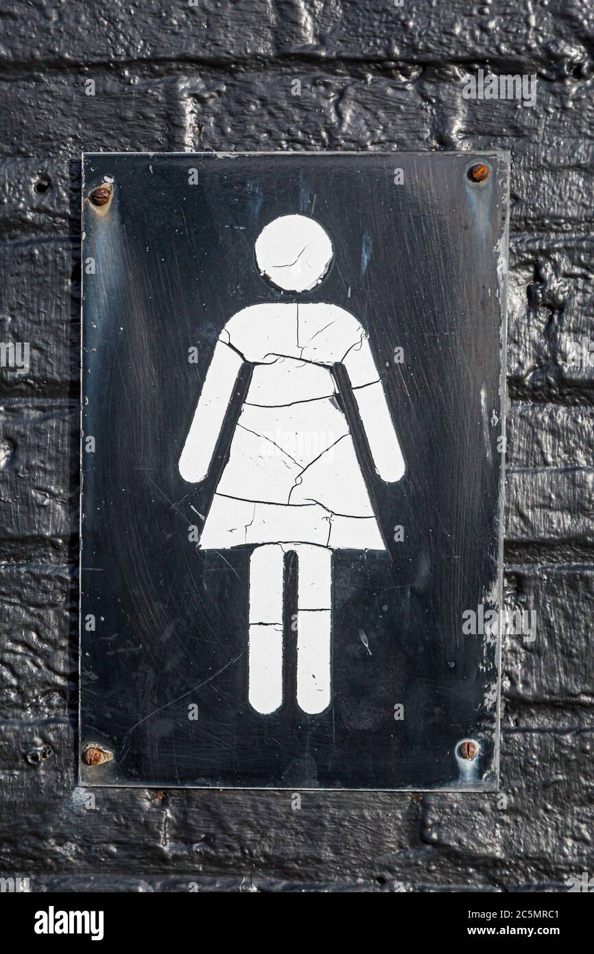 A female restroom sign in a UK town Stock Photo Alamy