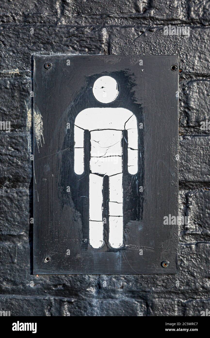 A male restroom sign in a UK town Stock Photo Alamy