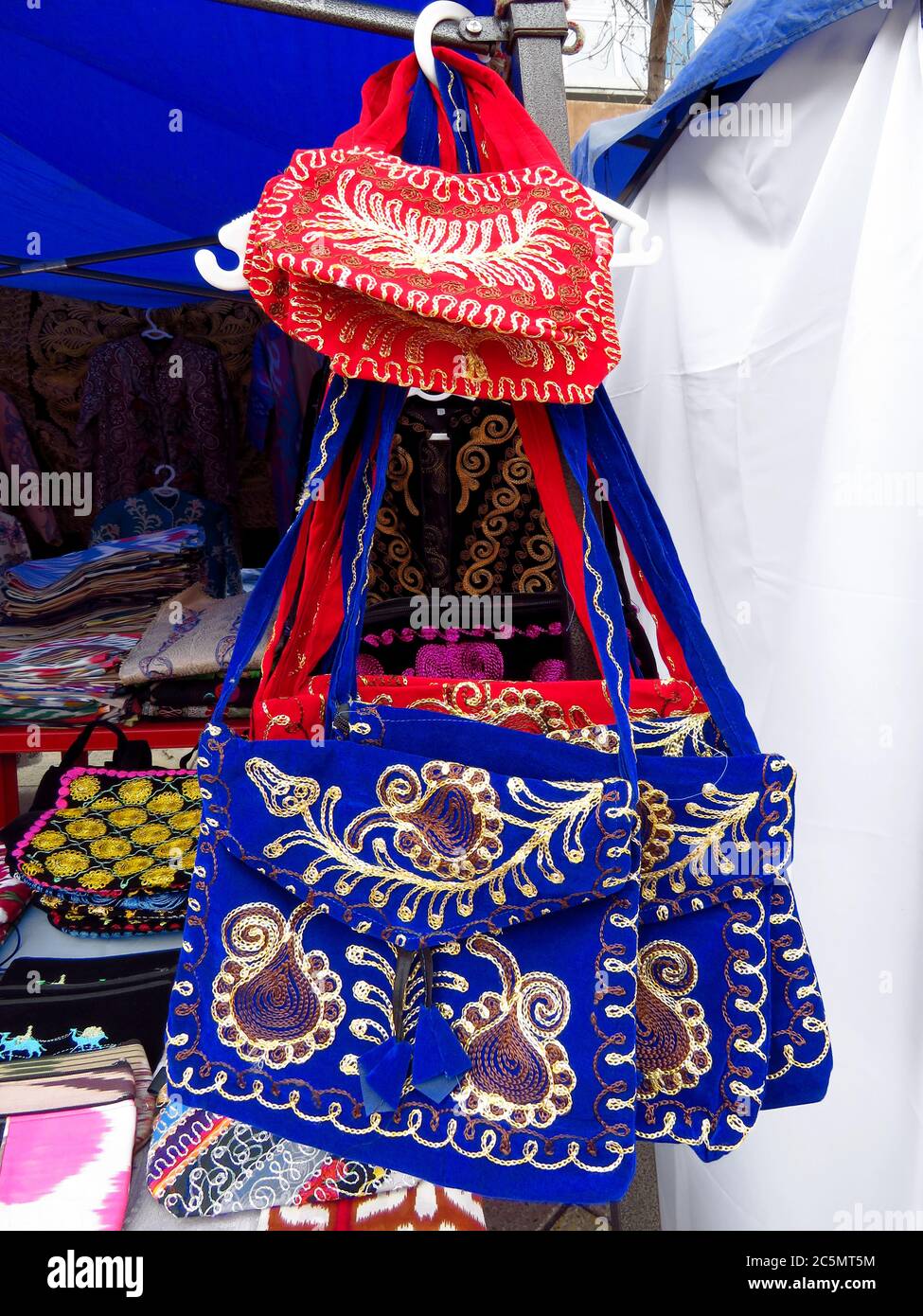 Traditional souvenirs - Kazakh ethnic handbags in street market in Almaty, Kazakhstan Stock Photo