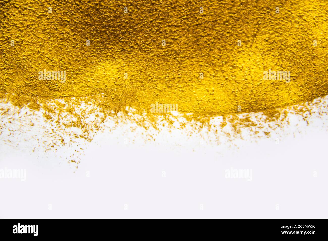 Abstract gold on the paper. A gold splatter against background