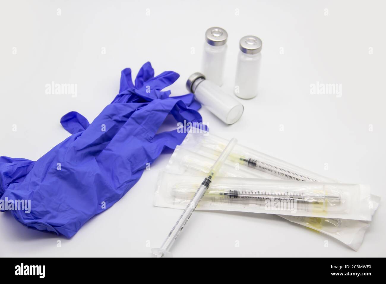 The bottles of insulin for diabetes and injection syringe. The ...