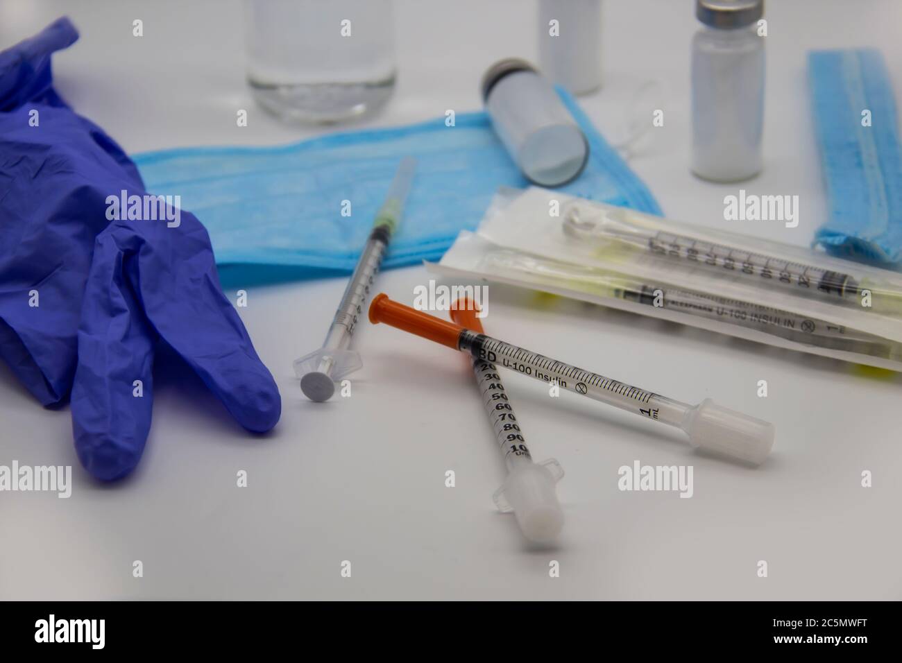 The bottles of insulin for diabetes and injection syringe. The ...