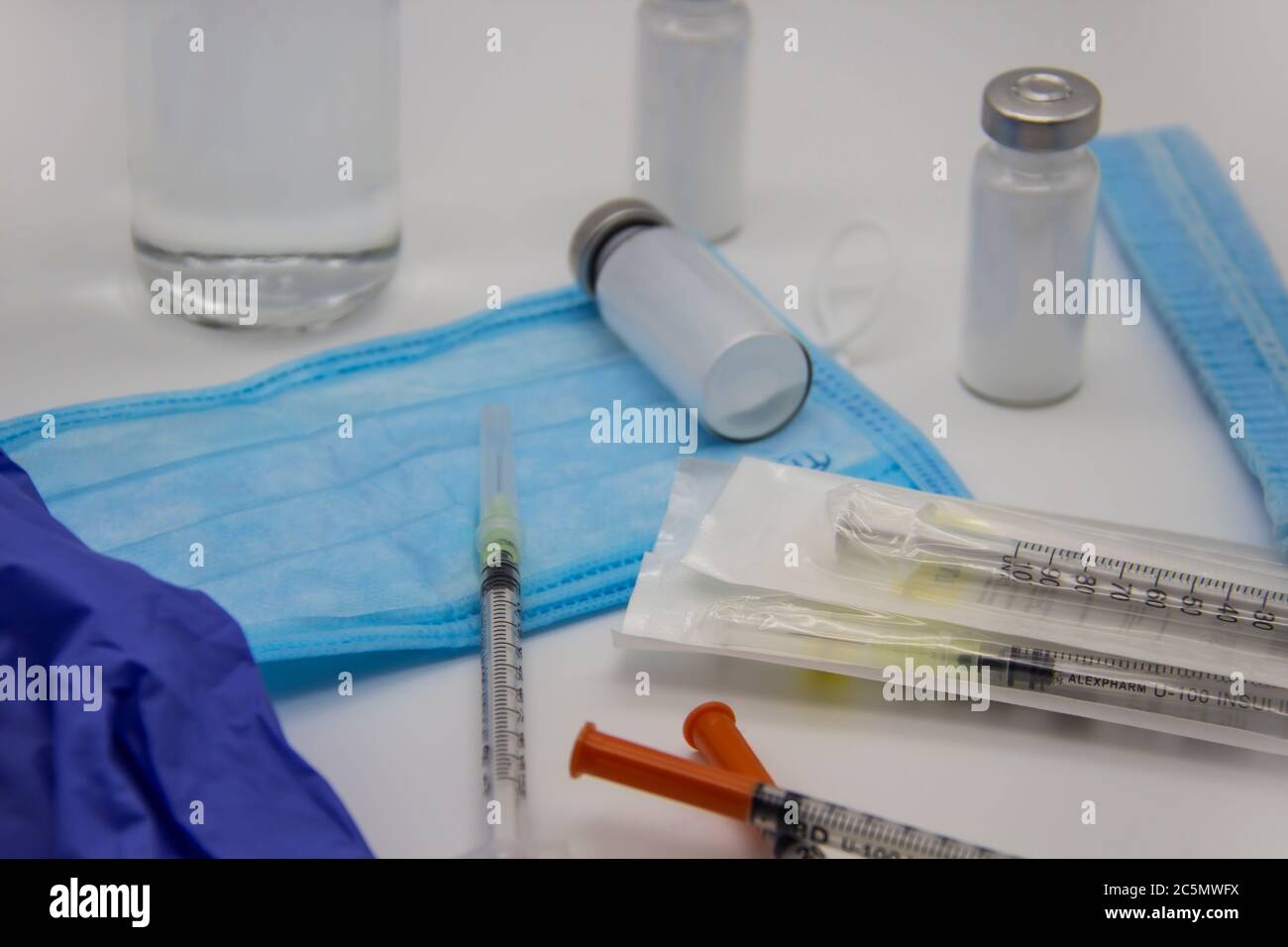 The bottles of insulin for diabetes and injection syringe. The