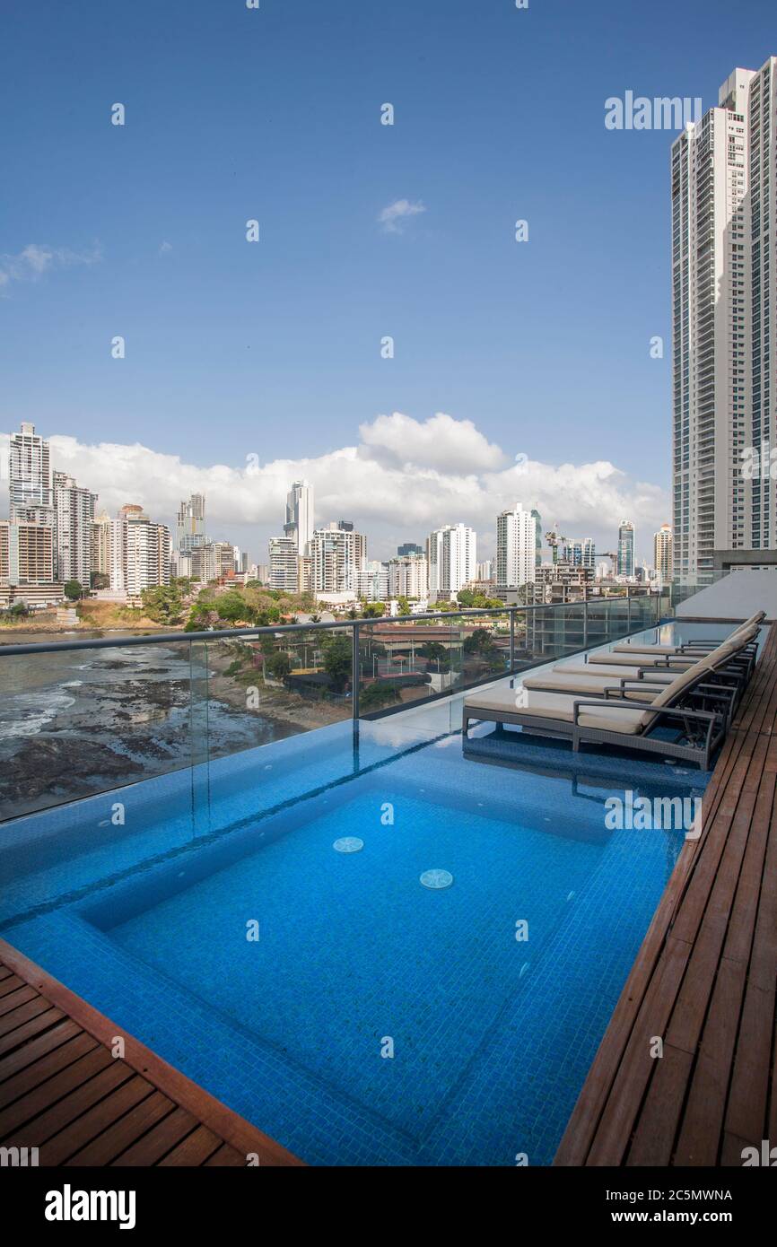 Panoramic view from the pool of a building with skyscrapers in the ...
