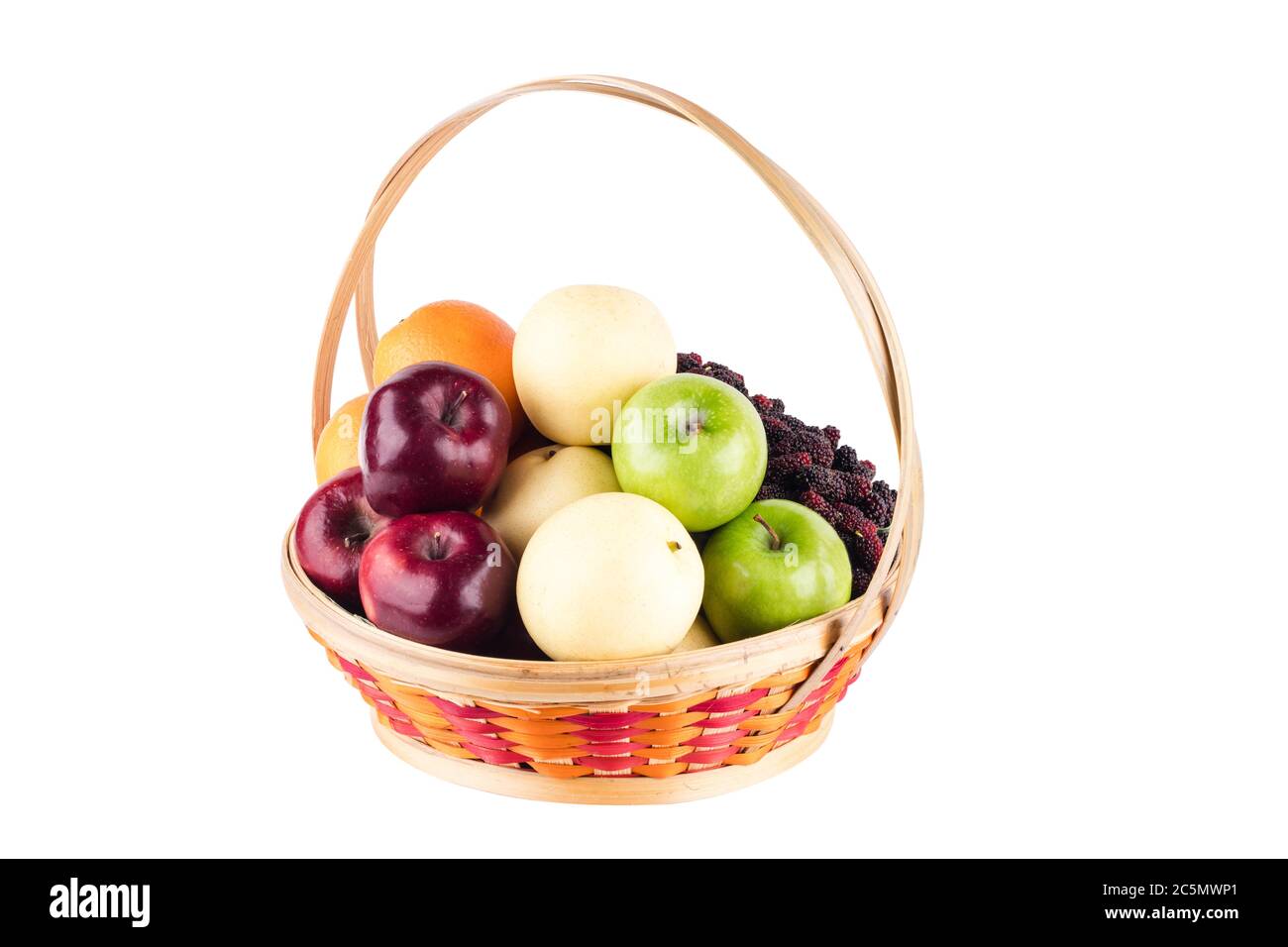 composition assorted fresh fruits such as orange, Chinese pear, mulberry, red apple and green applein  bamboo wicker basket on white background fruit Stock Photo