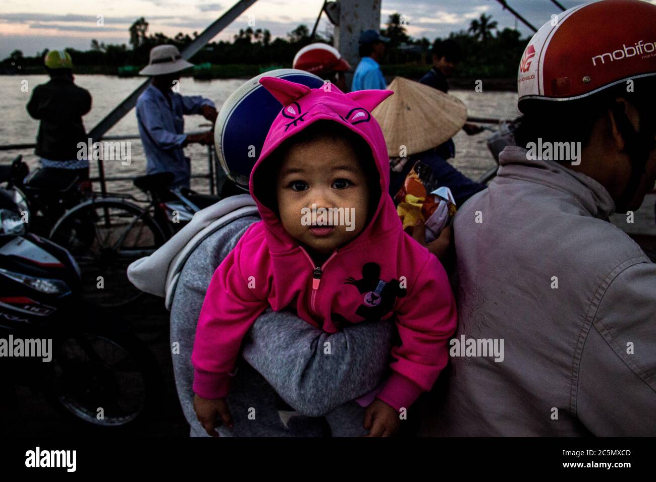 VIETNAM - ON THE FERRIES OF THE DELTA OF MEKONG. In the Mekong Delta ...