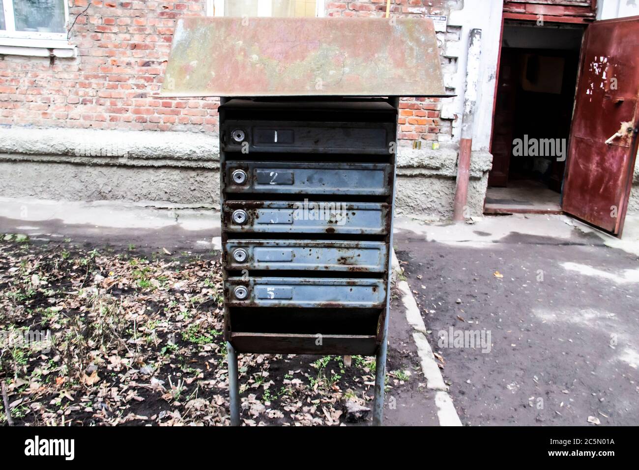 Old rusty mailboxes on the street Stock Photo Alamy
